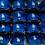 Rows of blue los angeles dodgers baseball caps